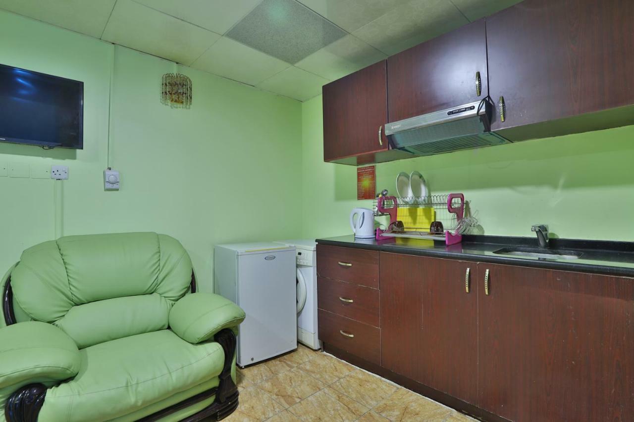 Oyo 261 Remas Hotel Apartment Dubai Exterior foto
